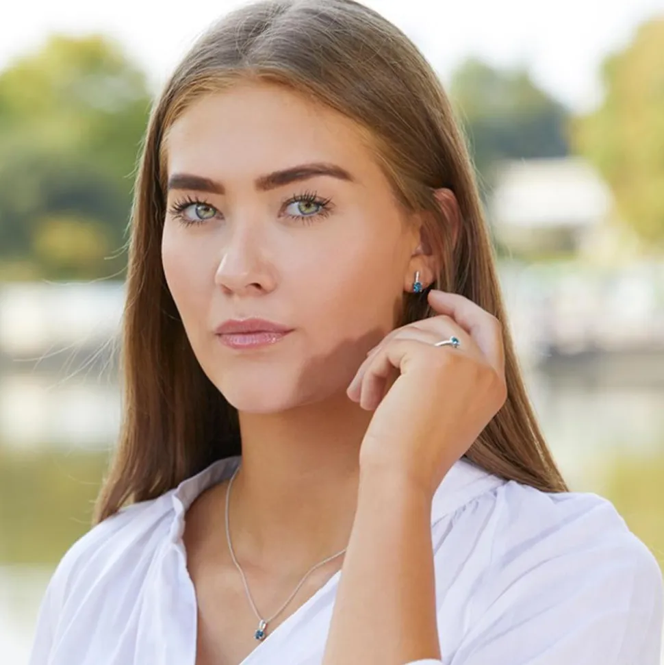 Diamantring aus 585er Weißgold mit Blautopas DR0438