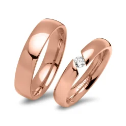 Rosévergoldete Edelstahl Eheringe mit Stein R9229s