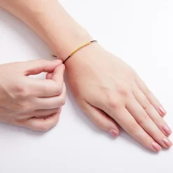 Textilarmband mit Zierelementen aus Silber vergoldet SB0347